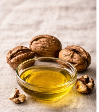 Walnut Oil and walnuts on a linen tablecloth