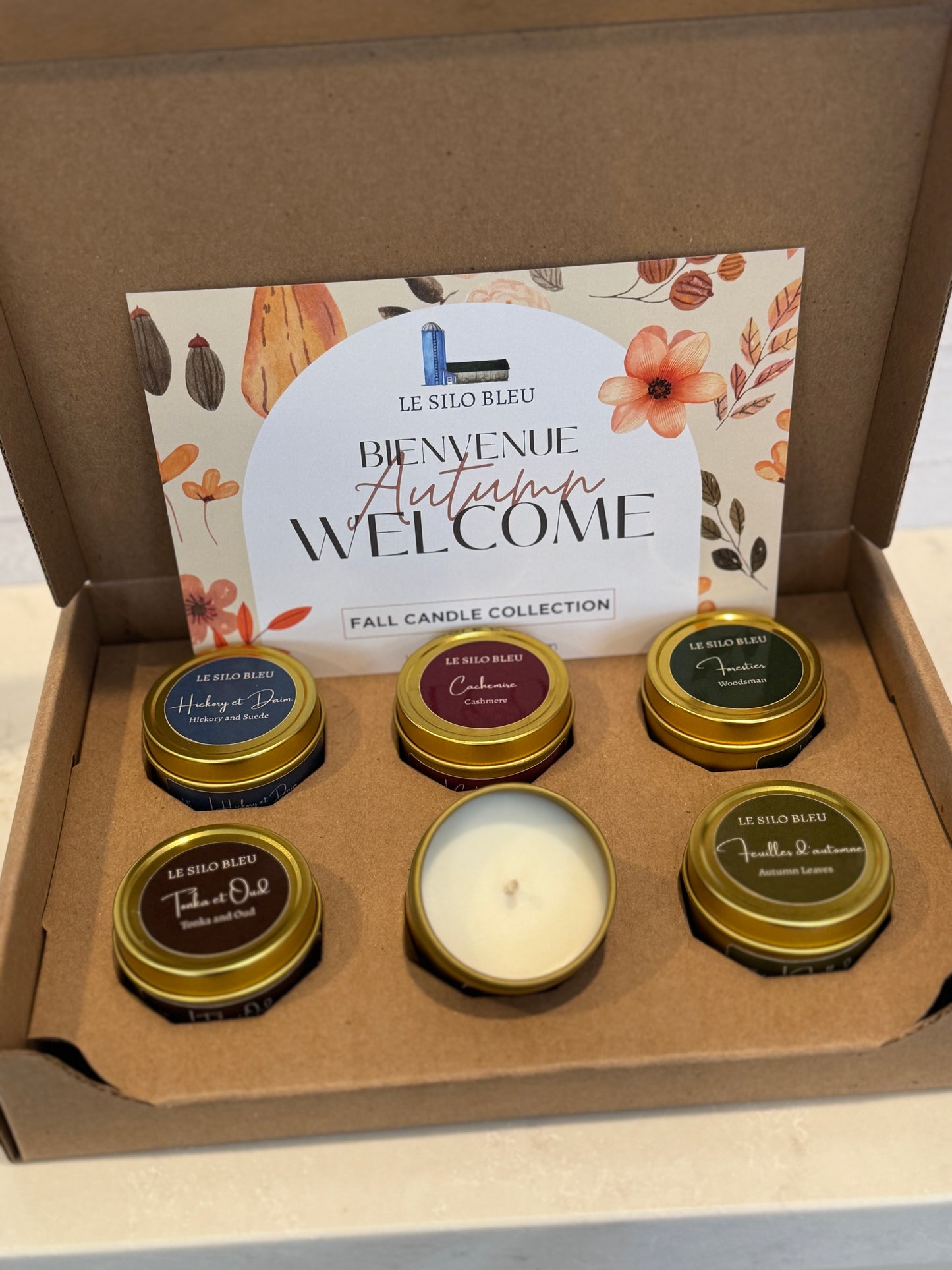 Box of Le Silo Bleu fall candle collection with six candles and a decorative card.