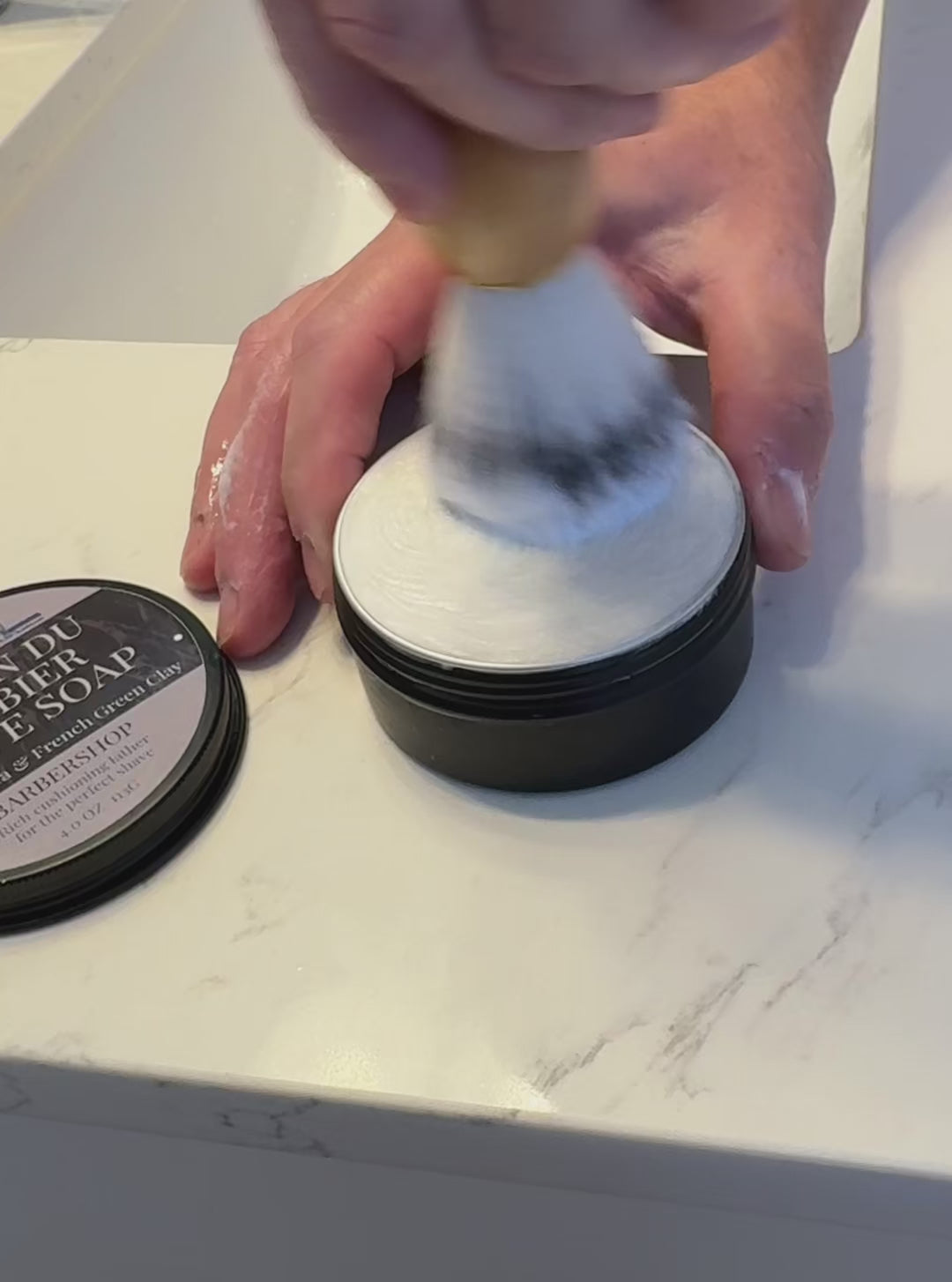 Video of shave soap loading onto a brush